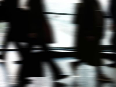 Abstract motion blur of a person jumping rope.